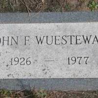 John F. WUESTEWALD